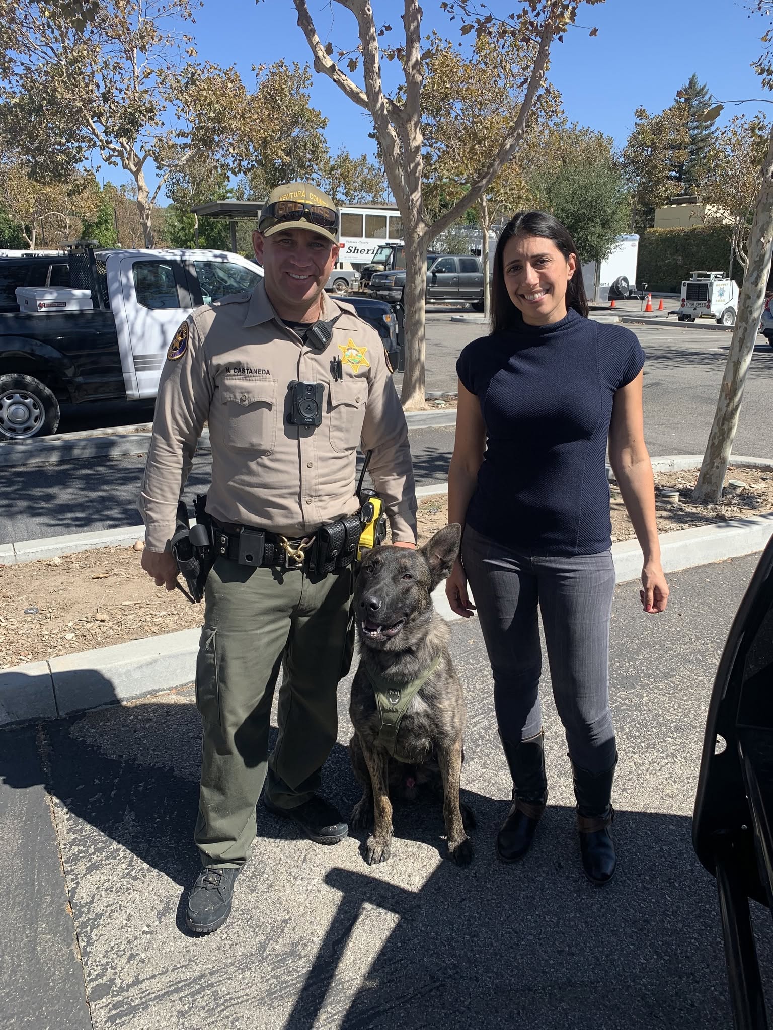 Renee Delgado with a Ventura County Sheriff's deputy and K-9